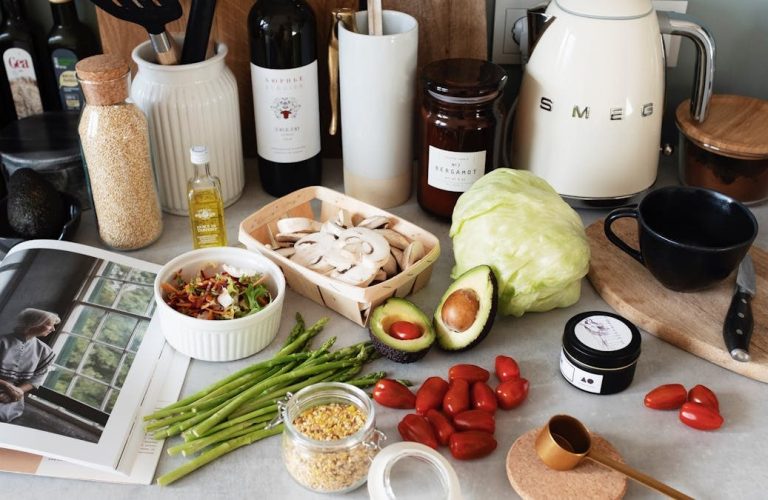 A variety of fresh ingredients and kitchen tools for preparing a healthy meal.